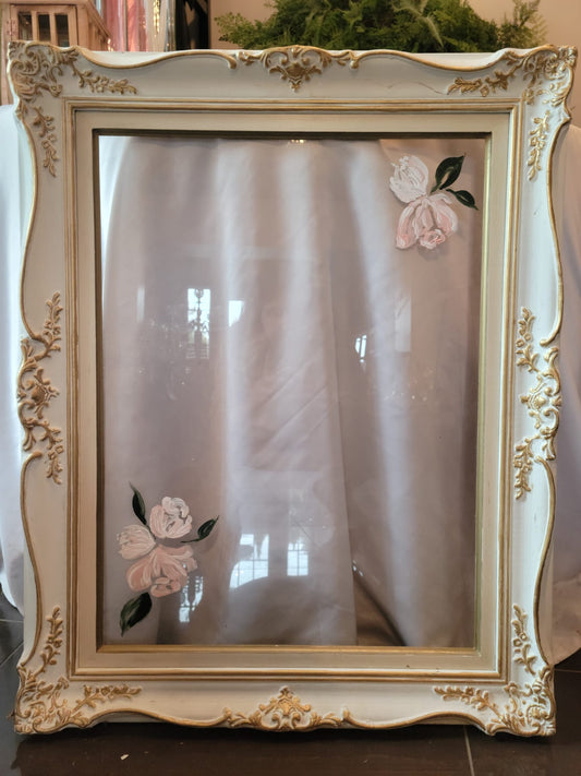 white framed glass with flower